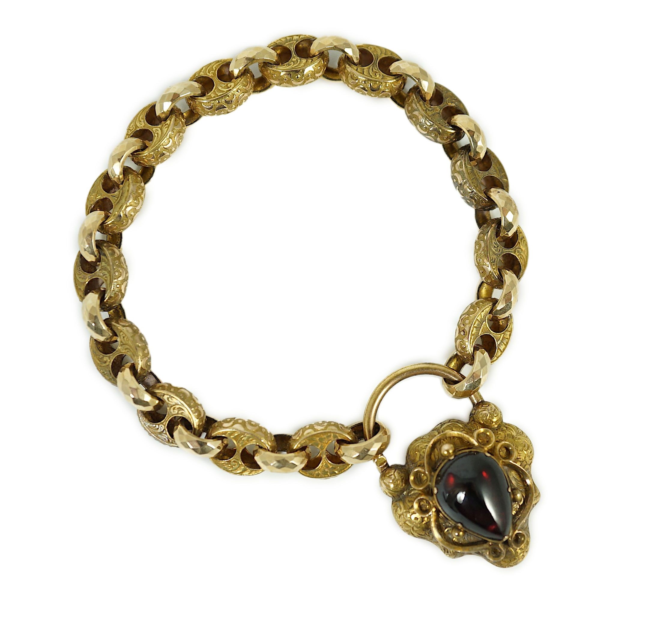 A Victorian engraved and facetted link gold mourning bracelet, with pear shaped foil backed? garnet set heart shape padlock